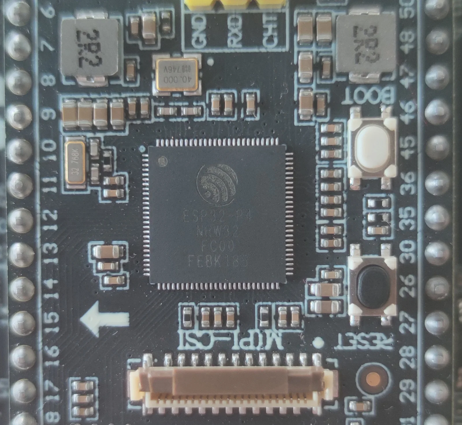 Close-up of an Espressif ESP32-P4 SoC on a small development board